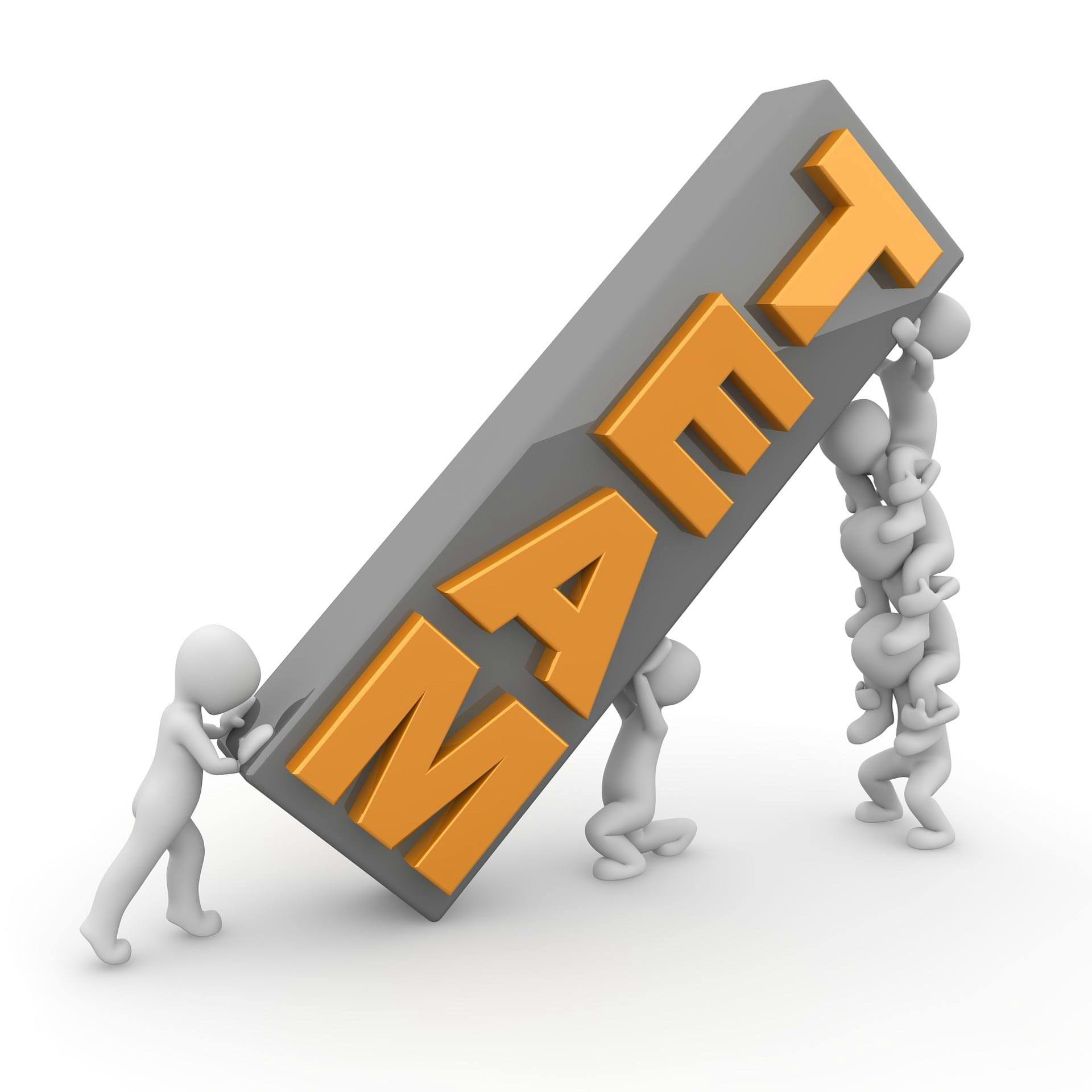 Figurer med et Team-skilt